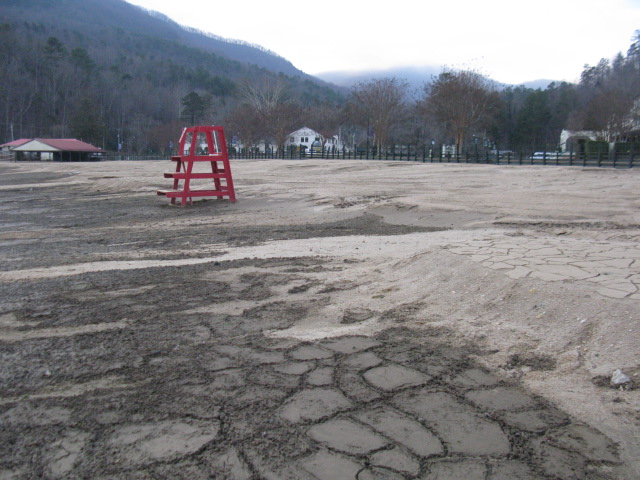 Lake Lure Beach on Feb. 6, 2025, showing silt deposits on concrete walking surfaces prior to rehab work