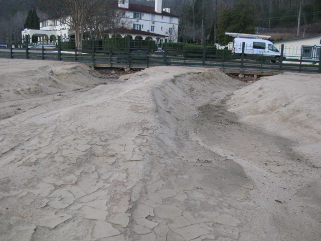 Lake Lure Beach on Feb. 6, 2025, showing beach erosion and sand mounding prior to rehab work